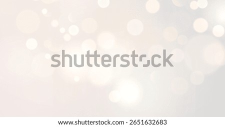 The light of gold dust, bokeh light effect background. Christmas glowing dust background, Yellow flickering glow with confetti bokeh light and particle motion. The dust sparks and golden stars shine.