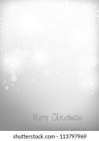 Light gray abstract Christmas background with white snowflakes