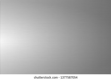 Light gray brushed metallic texture. Shiny polished metal background.