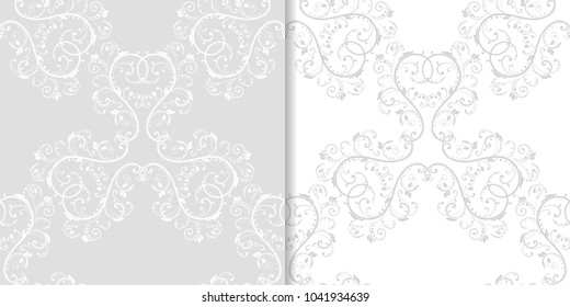 Light gray floral backgrounds. Set of seamless patterns for textile and wallpapers