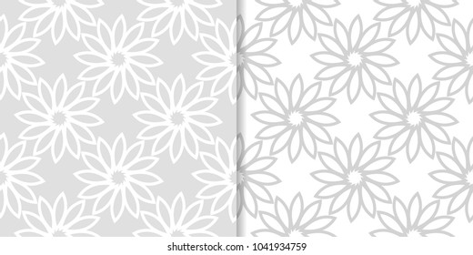 Light gray floral backgrounds. Set of seamless patterns for textile and wallpapers