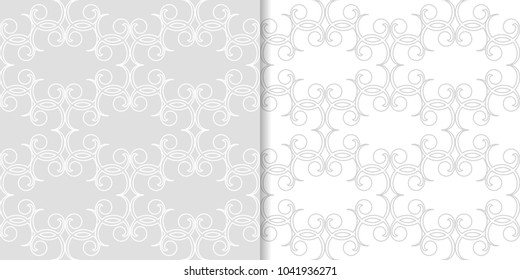 Light gray floral backgrounds. Set of seamless patterns for textile and wallpapers