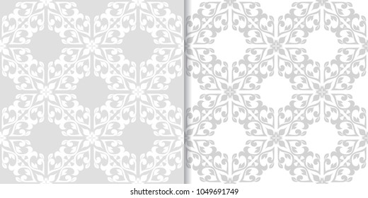 Light gray floral backgrounds. Set of seamless patterns for textile and wallpapers