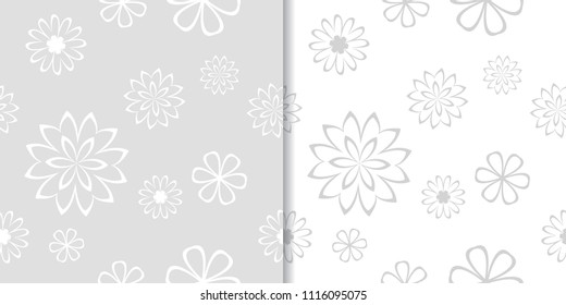 Light gray floral backgrounds. Set of seamless patterns for textile and wallpapers