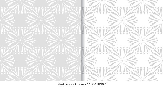 Light gray floral backgrounds. Set of seamless patterns for textile and wallpapers