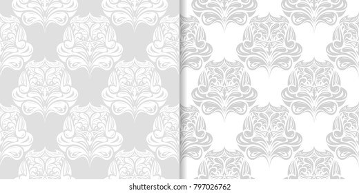 Light gray floral backgrounds. Set of seamless patterns for textile and wallpapers