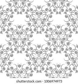Light gray floral design on white background. Seamless pattern for textile and wallpapers