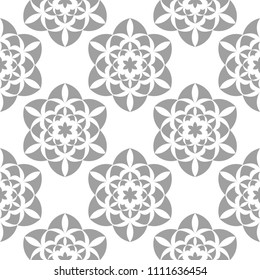 Light gray floral ornament on white. Seamless pattern for textile and wallpapers