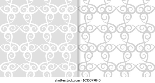 Light gray floral ornaments. Set of seamless patterns for textile and wallpapers