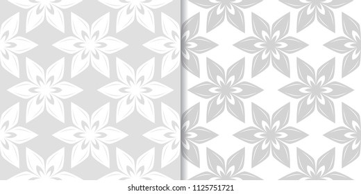 Light gray floral ornaments. Set of seamless patterns for textile and wallpapers