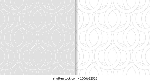 Light gray geometric ornaments. Set of seamless patterns for web, textile and wallpapers