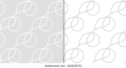 Light gray geometric ornaments. Set of seamless patterns for web, textile and wallpapers