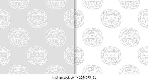 Light gray geometric ornaments. Set of seamless patterns for web, textile and wallpapers