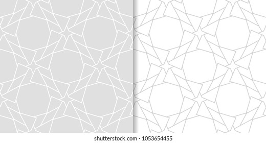 Light gray geometric set of seamless patterns for web, textile and wallpapers