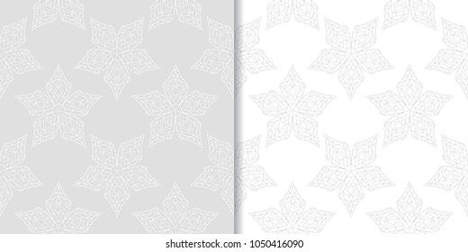 Light gray set of floral backgrounds. Seamless patterns for textile and wallpapers