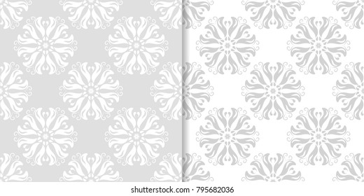 Light gray set of floral backgrounds. Seamless patterns for textile and wallpapers