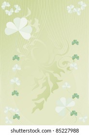 Light green background with leaves of clover.Postcard. Background.