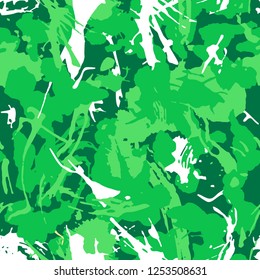 Light green camouflage pattern with paint strokes and splashes elements for textile. Bright colorful grunge wallpaper. Textile, sport clothes, wrapping paper. Abstract fashionable vector background. 
