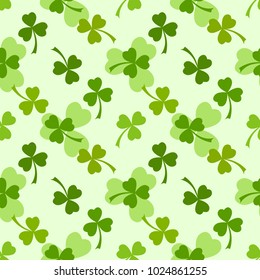 Light green clover leaves vector seamless pattern. Nature spring background. Irish traditional St. Patrick's day design element.