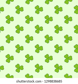 Light green clover leaves vector seamless pattern. Nature spring background. Irish traditional St. Patrick's day design element.