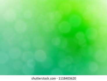 Light Green vector blurred bright pattern. A completely new color illustration in a bokeh style. The template can be used for your brand book.