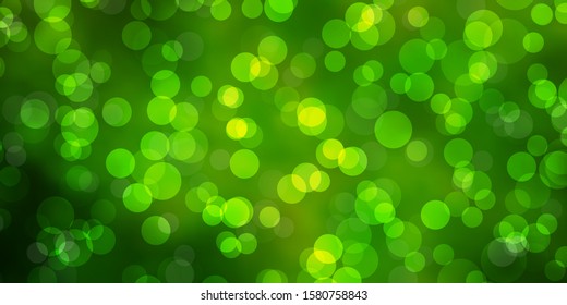 Light Green, Yellow vector pattern with spheres. Glitter abstract illustration with colorful drops. New template for a brand book.