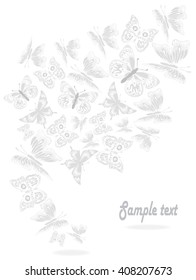 Light grey butterflies on a white background