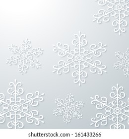 Light grey winter background with snowflakes