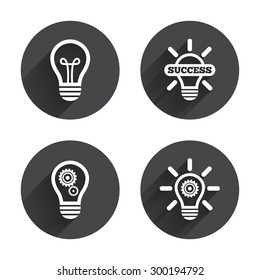 Light lamp icons. Lamp bulb with cogwheel gear symbols. Idea and success sign. Circles buttons with long flat shadow. Vector