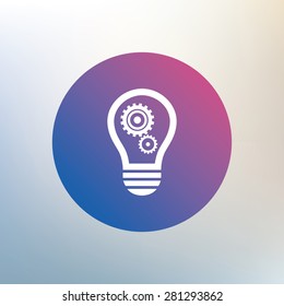Light lamp sign icon. Bulb with gears and cogs symbol. Idea symbol. Icon on blurred background. Vector