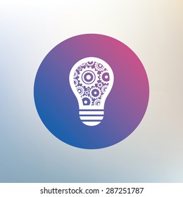 Light lamp sign icon. Bulb with gears and cogs symbol. Idea symbol. Icon on blurred background. Vector