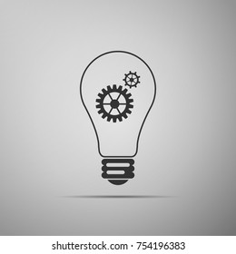 Light lamp sign icon isolated on grey background. Bulb with gears and cogs working together symbol. Idea concept. Flat design. Vector Illustration