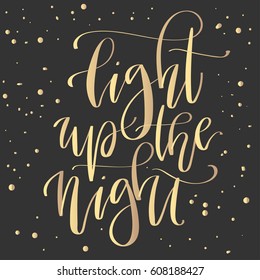'Light up the night' - modern lettering quote. Vector hand written gold ink calligraphy phrase isolated on a black background