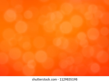 Light Orange vector blurred bright background. A completely new color illustration in a bokeh style. The elegant pattern for brand book.