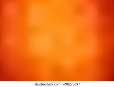 Light Orange vector blurred and colored background. Shining colored illustration in a brand-new style. The blurred design can be used for your web site.