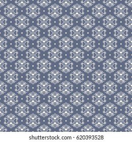 Light ornament with swirls and dots on a blue background. Seamless vector pattern