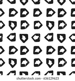 light painted black graphic pattern of rectangular shapes and arrows with textures on a white background