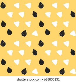 light painted color, graphic pattern of white triangles with rounded edges and black drops with textures on a yellow background