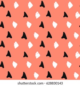 light painted color pattern of graphic shapes and textures with arrows on a red background