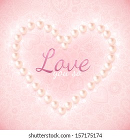 Light pink ornate background with pearly heart