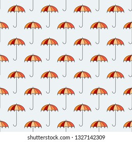 Light seamless background with bright umbrellas. Open umbrella cane repeats on sky blue background