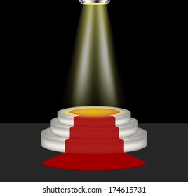 Light shines on the empty podium with red carpet	
