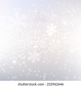 Light Silver Abstract Christmas Background with White Blurred Snowflakes