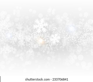 Light Silver Abstract Christmas Background with White Blurred Snowflakes 