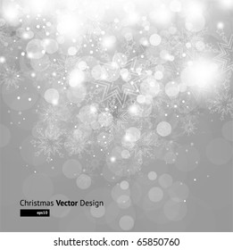 Light silver abstract Christmas background with white snowflakes