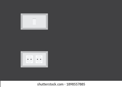 Interruptor de luz y toma de corriente en la pared gris con espacio de copia