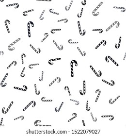 Light Yellow vector seamless background with sweet xmas lollipops.