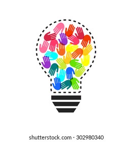 Lightbulb with colorful handprints inside as teamwork and idea concept