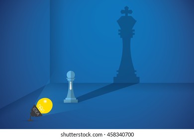 lightbulb flash the pawn chess to shows big shadow of king chess, idea and business concept