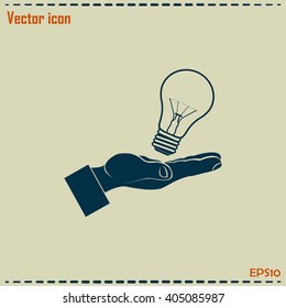 Lightbulb in hand icon vector